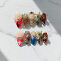 Furnunubi Handmade Almond Press-On Nails – 3D Hearts, Stars, Flames & Cherry Motifs (XS)