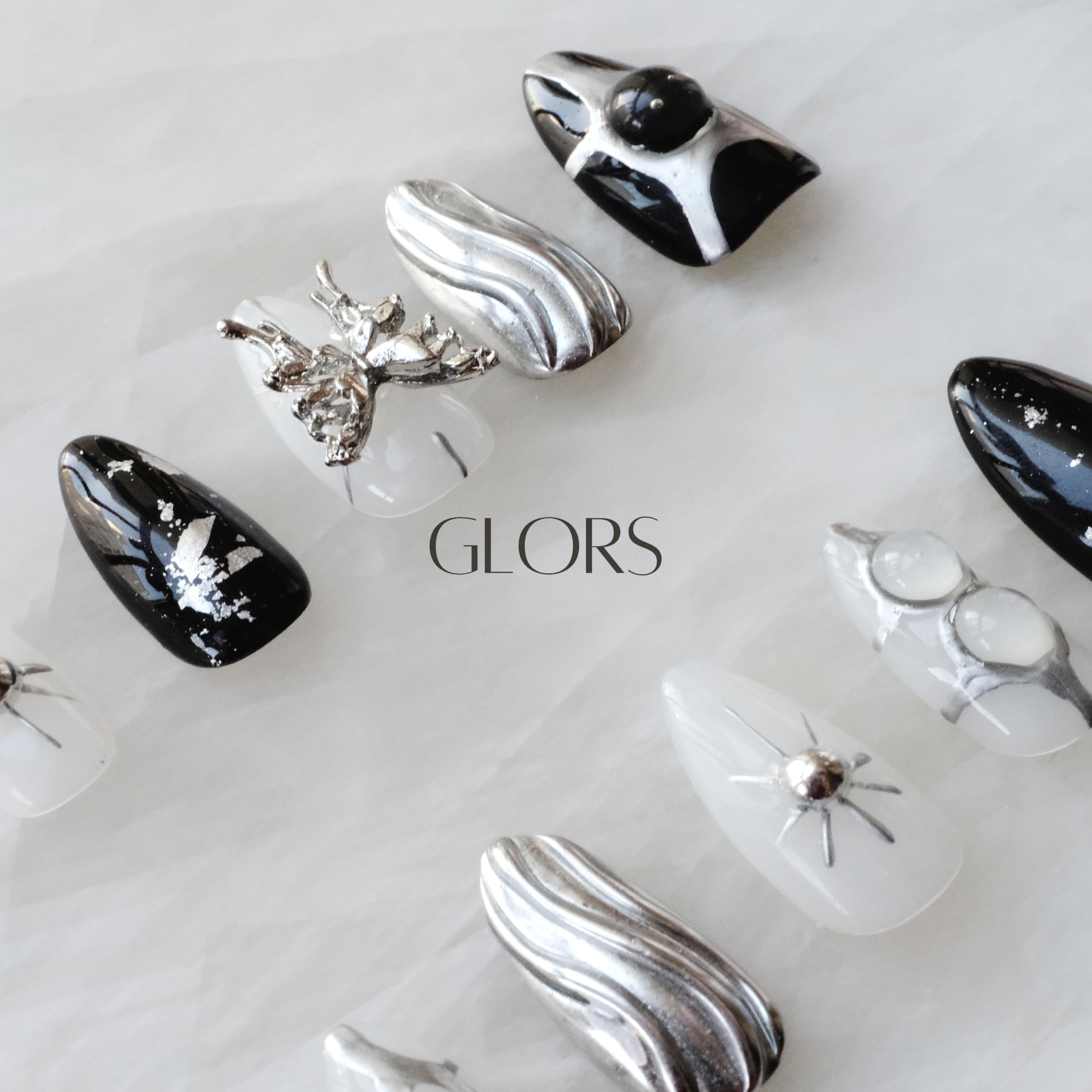 GLORS Gothic Long Almond Press-On Nails – Black & Silver with Butterfly Accent