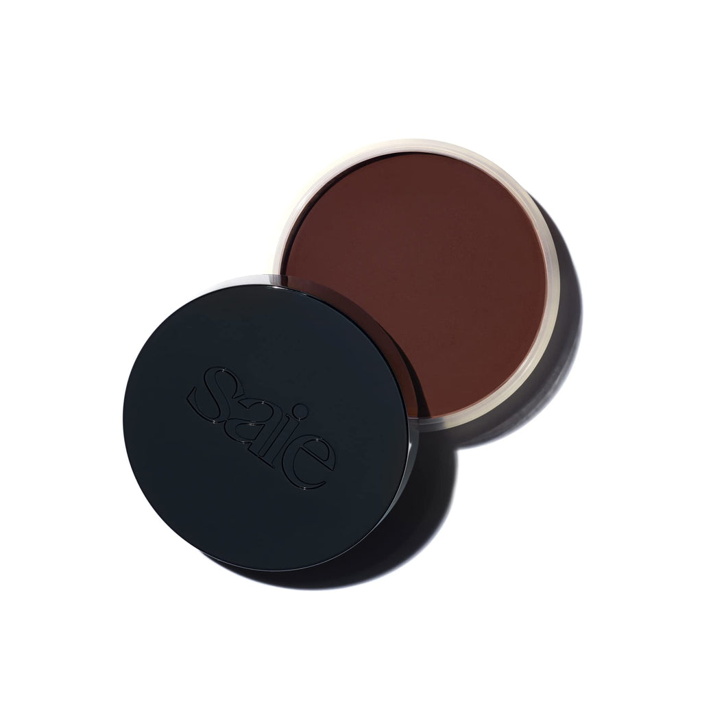 Saie Sun Melt Cream Bronzer – Buildable Balm for Natural Glow & Soft Sculpt (Dark Bronze, 1 oz)